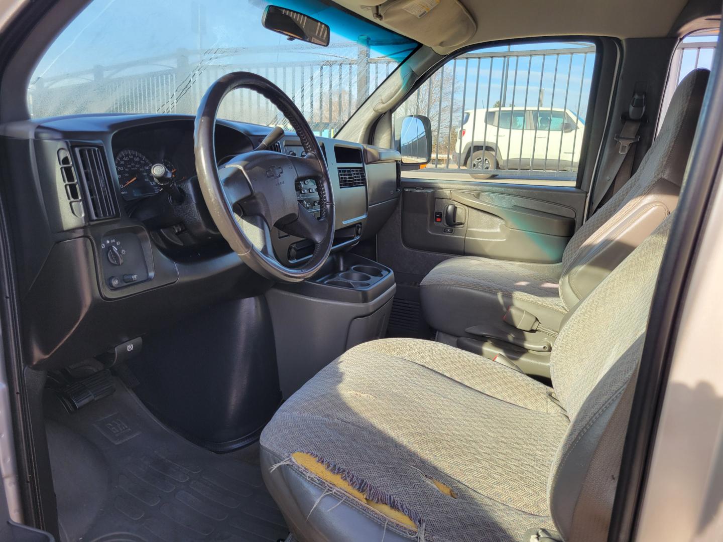 2007 White /Tan Chevrolet Express Express (1GNFH15Z471) with an 5.3L V8 engine, 4 Speed Auto transmission, located at 450 N Russell, Missoula, MT, 59801, (406) 543-6600, 46.874496, -114.017433 - Runs well. Shifts great. AWD works Perfectly. But... Has a few dash lights on. (ABS, Check Engine and Airbag) Seats 11. 5.3L V8. 4 Speed Automatic Transmission. Front and Rear Climate Control. AM FM CD Player. Power Windows and Locks. Because of the Miles, Financing is NOT Available. - Photo#11